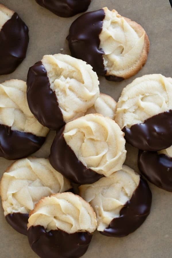 Chocolate Dipped Cookies stacked on top of each other.