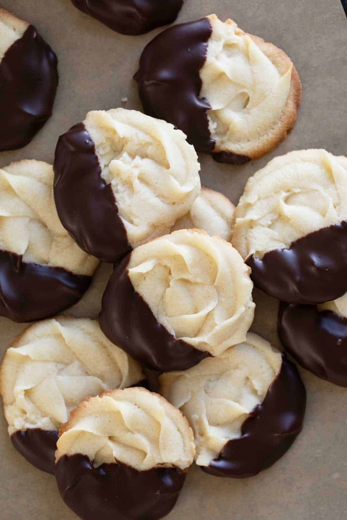 Chocolate Dipped Cookies stacked on top of each other.