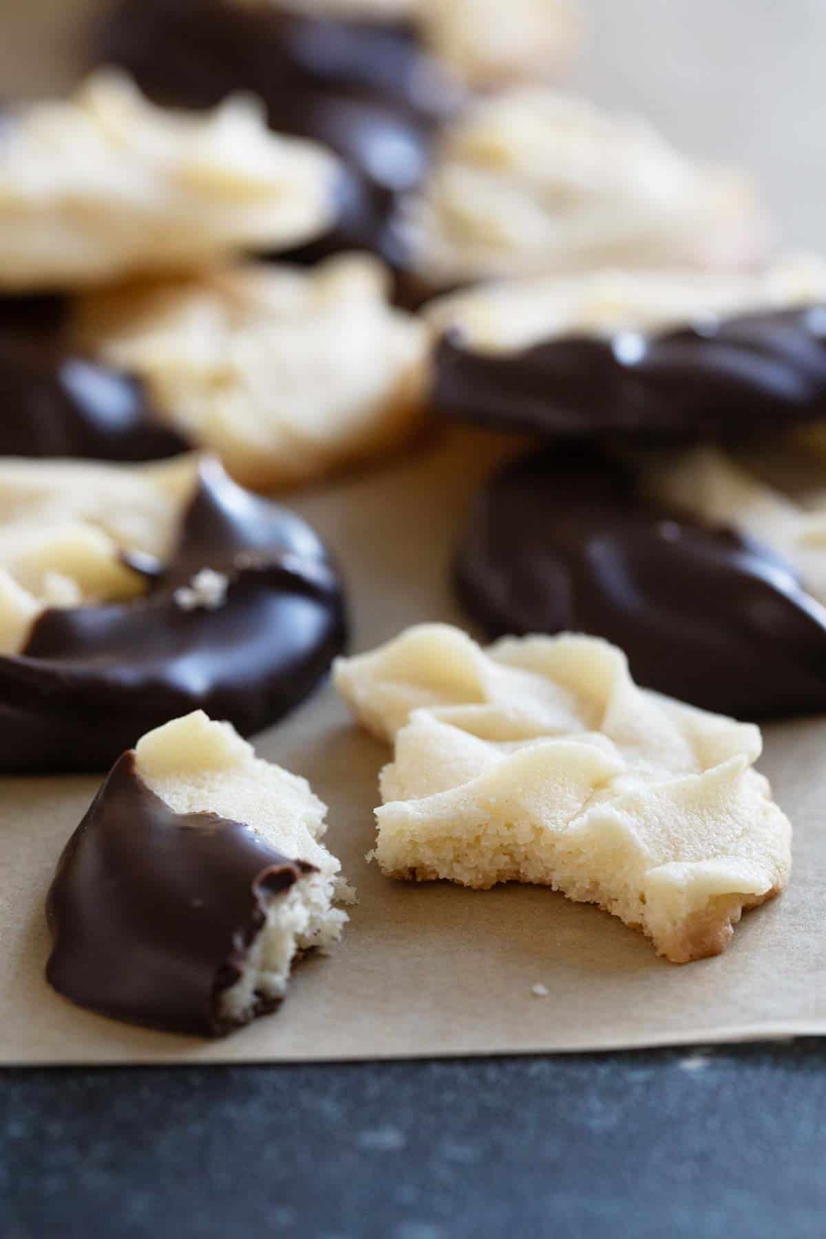 Chocolate Dipped Cookie torn in half to show texture.