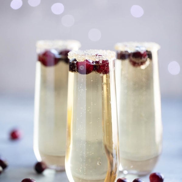 Glasses rimmed with sugar and filled with Holiday Punch.