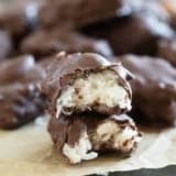 Homemade Almond Joys in half to show inside.