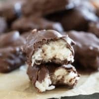 Homemade Almond Joys in half to show inside.