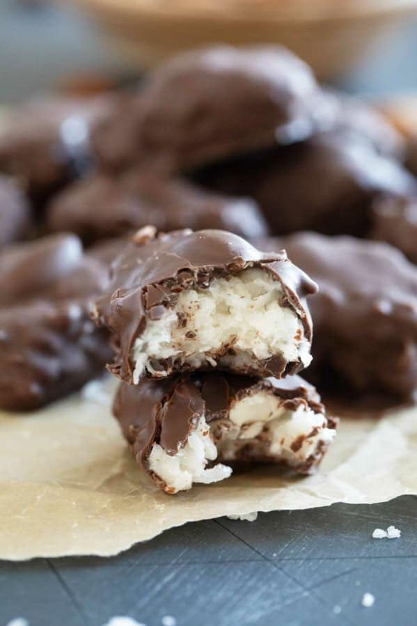 Homemade Almond Joys in half to show inside.