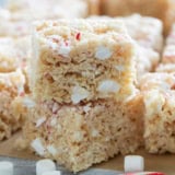 Peppermint Rice Krispie Treats stacked on top of each other.