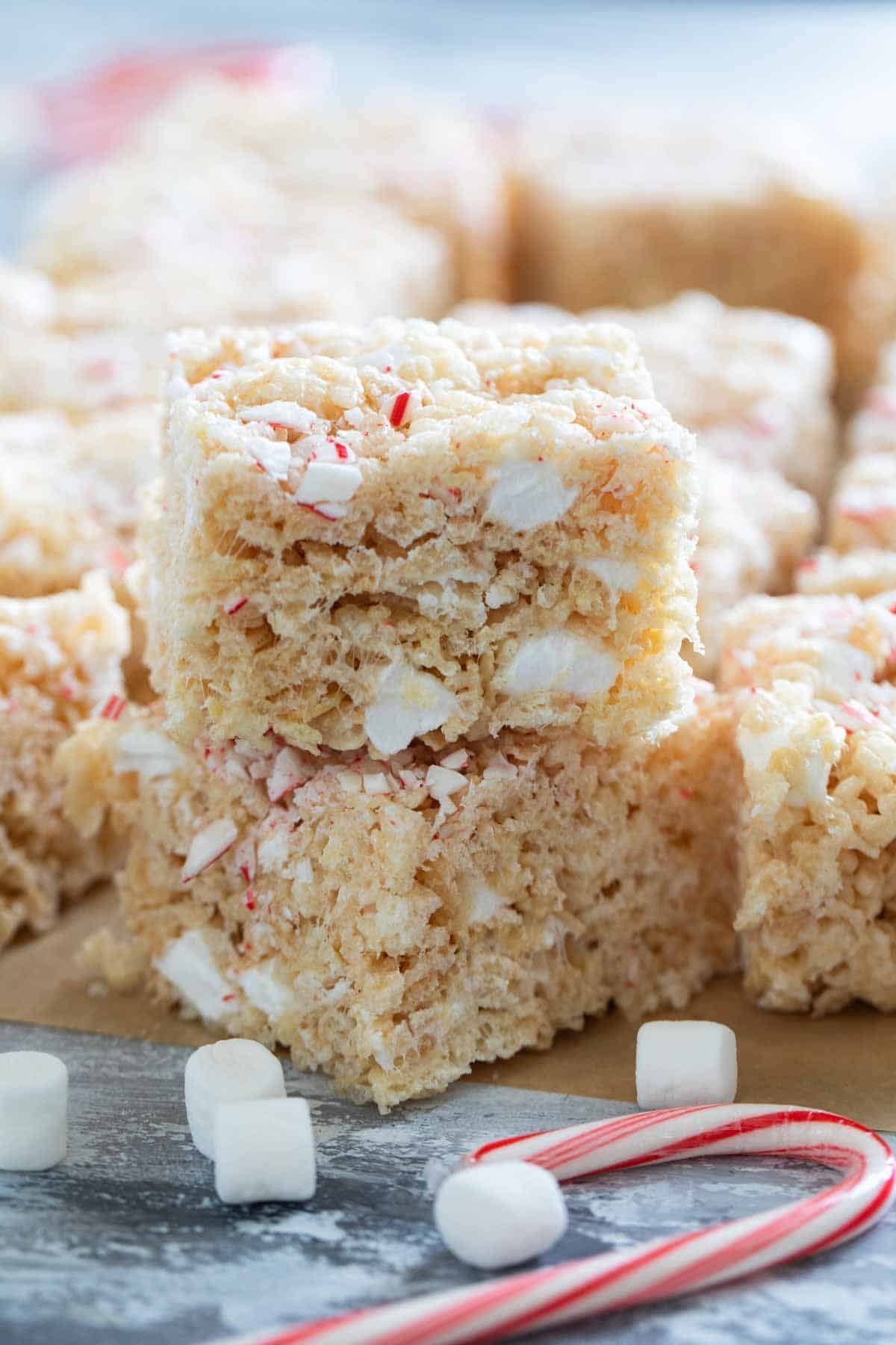 Peppermint Rice Krispie Treats stacked on top of each other.