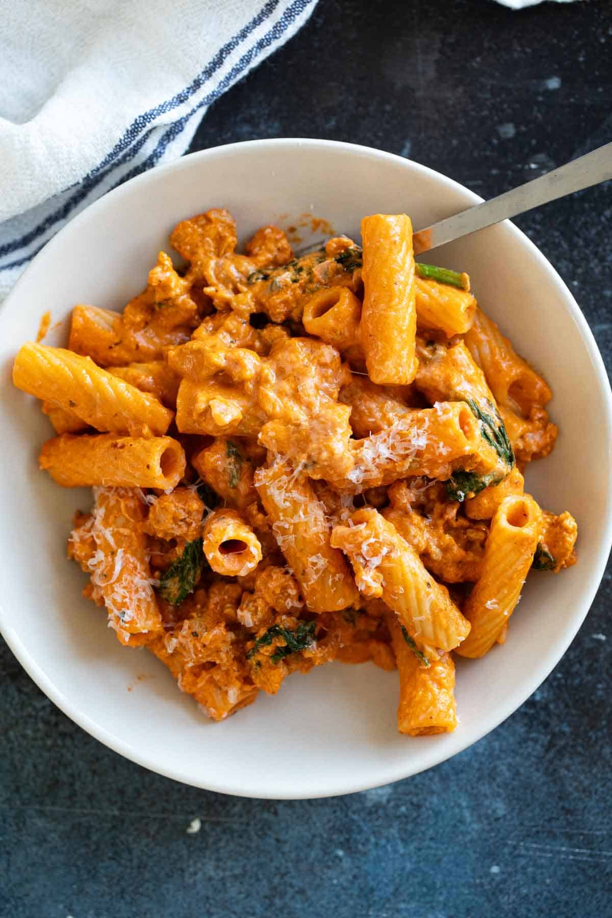 Bowl with Cottage Cheese Pasta topped with parmesan cheese.