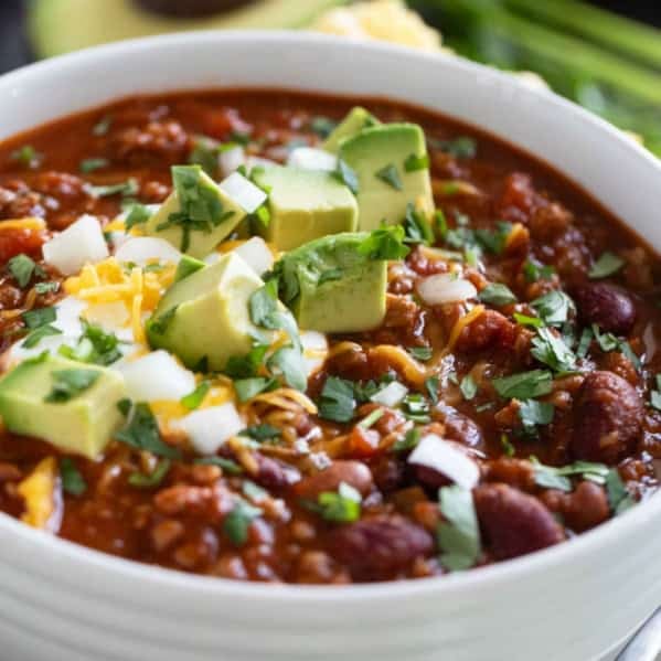 Bowl of Flatlander Chili with beef, sausage, beans, and tomatoes.