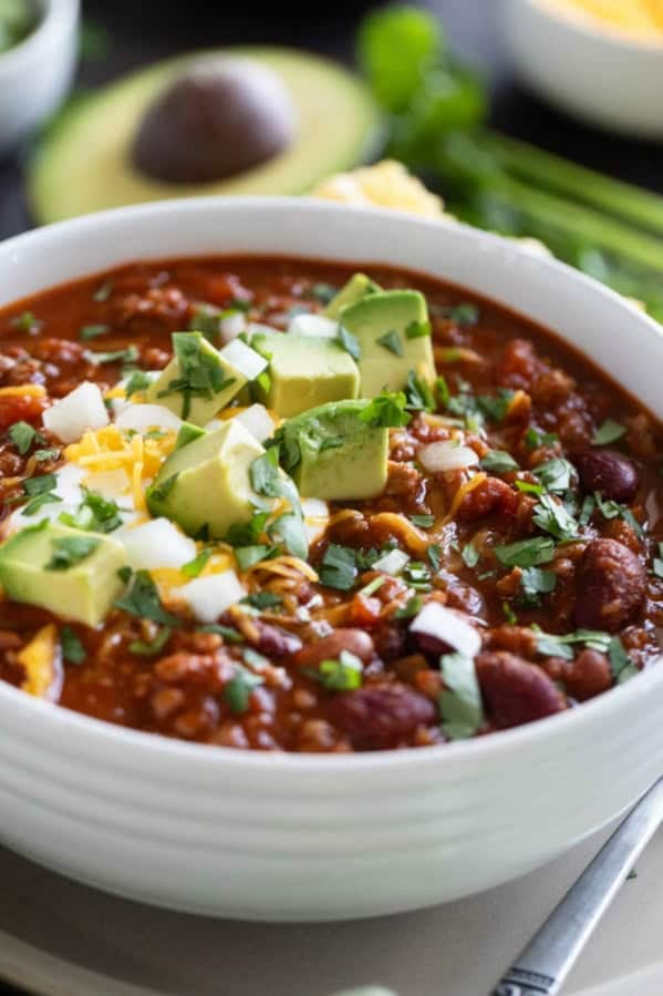 Bowl of Flatlander Chili with beef, sausage, beans, and tomatoes.