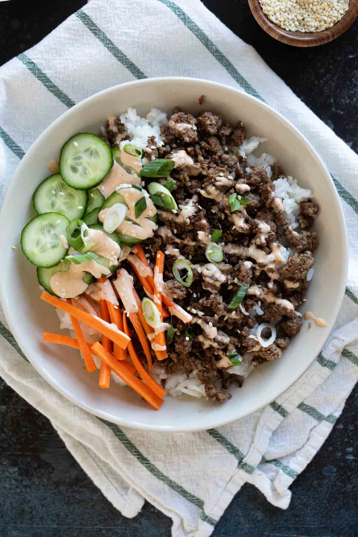 Korean Beef Bowls topped with gochujang mayo.