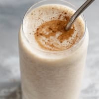 Vanilla Chai Smoothie topped with spices.