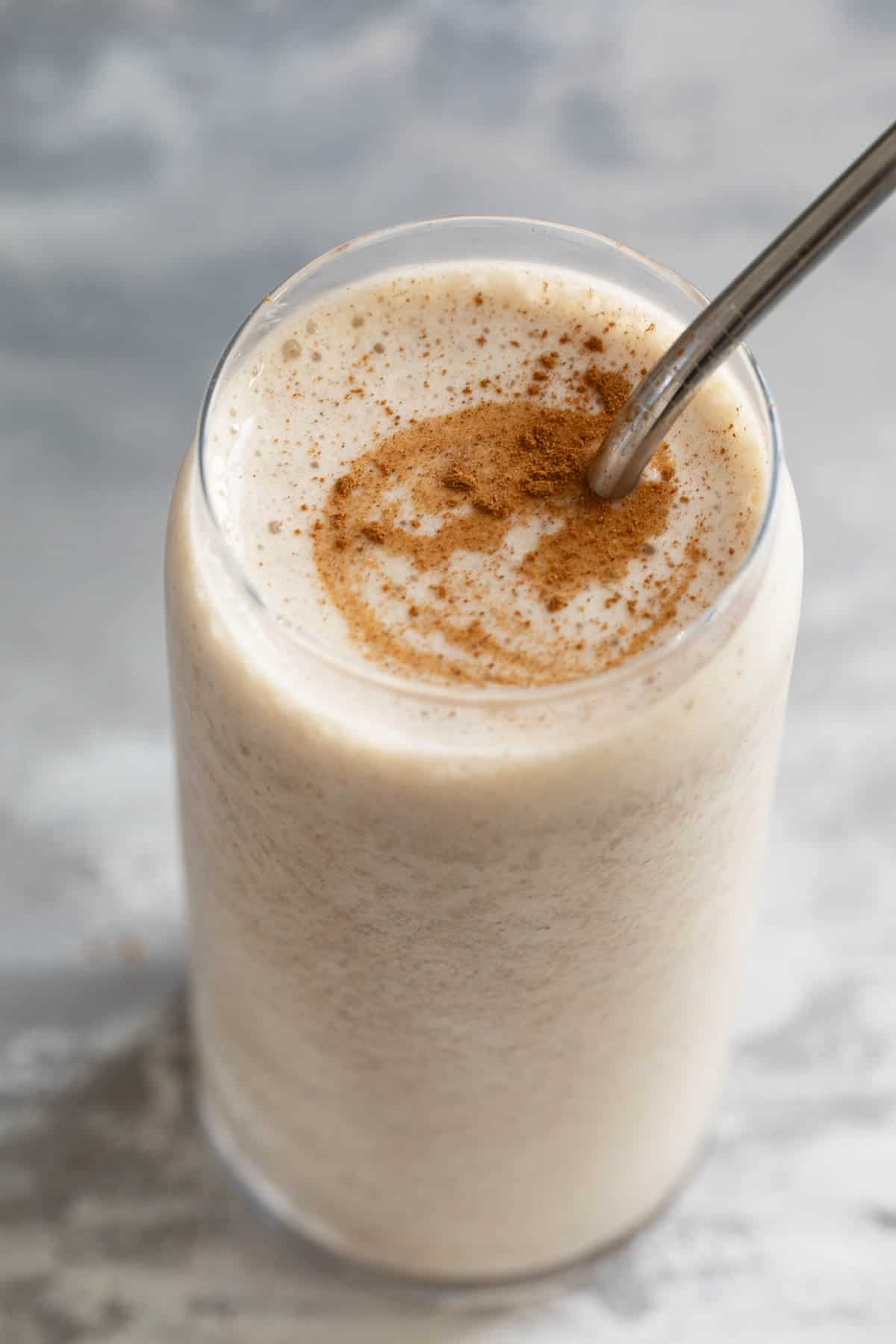 Vanilla Chai Smoothie topped with spices.