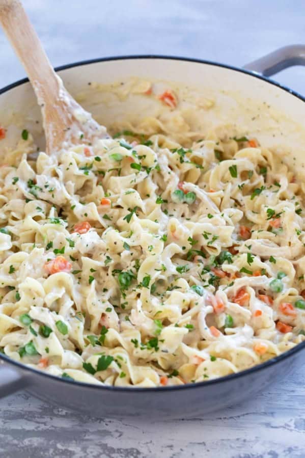 Chicken Pot Pie Pasta in a skillet, topped with parsley.