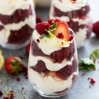 Red Velvet Trifle with layers of red velvet cake and cream cheese whipped cream.