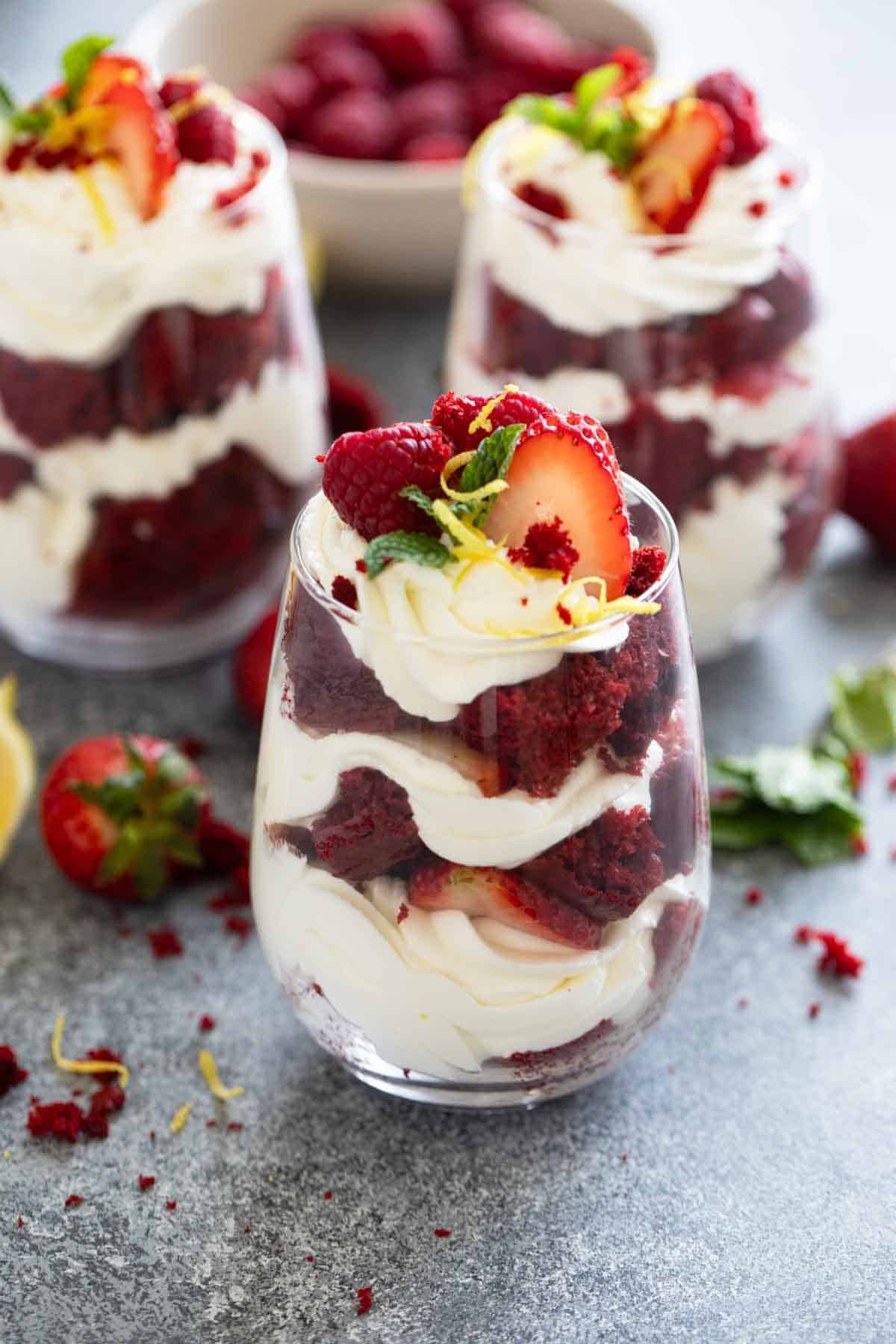 Red Velvet Trifle with layers of red velvet cake and cream cheese whipped cream.