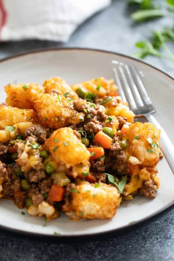Plate with a serving of Shepherd's Pie Tater Tot Casserole.
