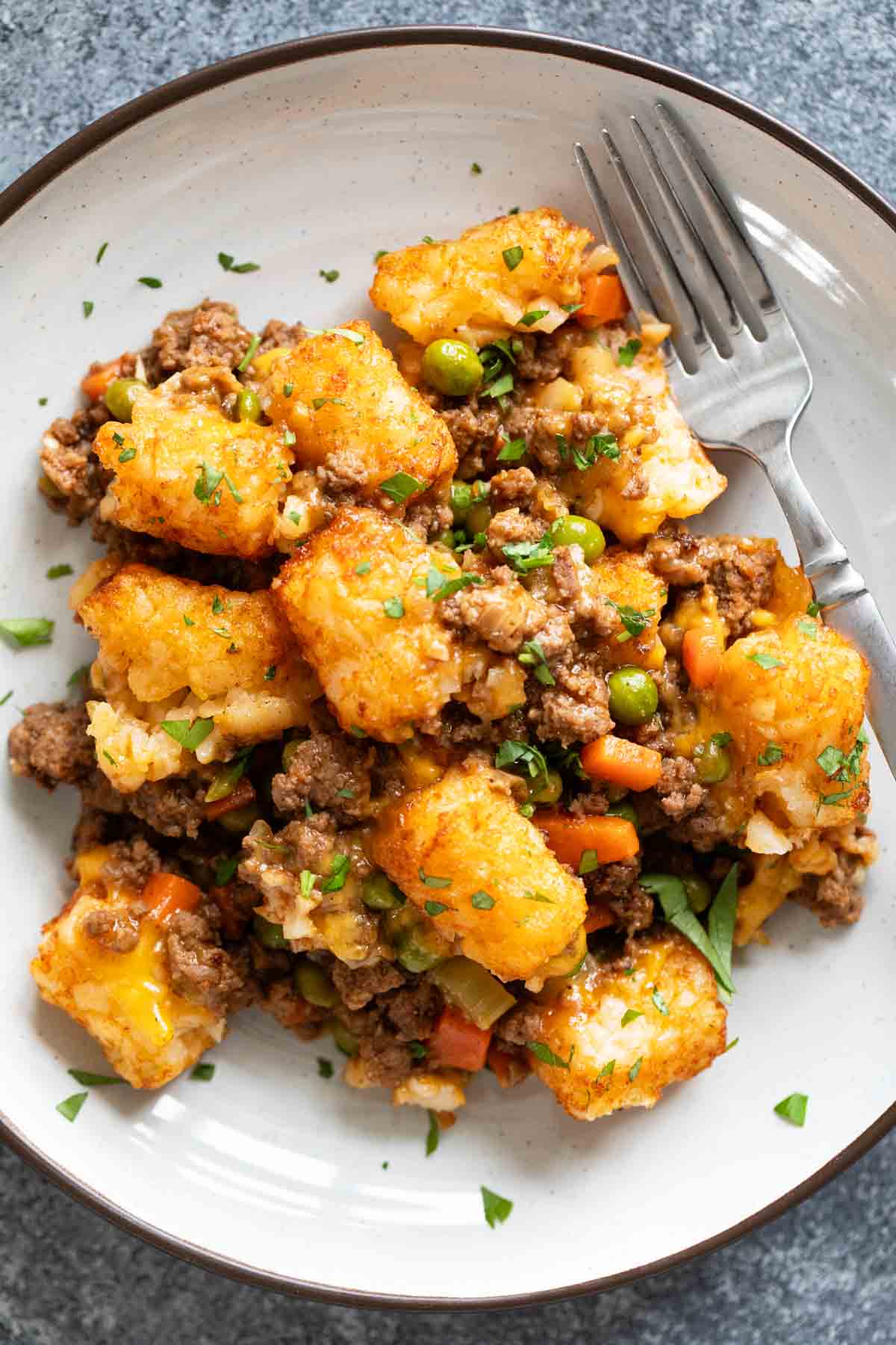 Plate with a serving of Shepherd's Pie Tater Tot Casserole.