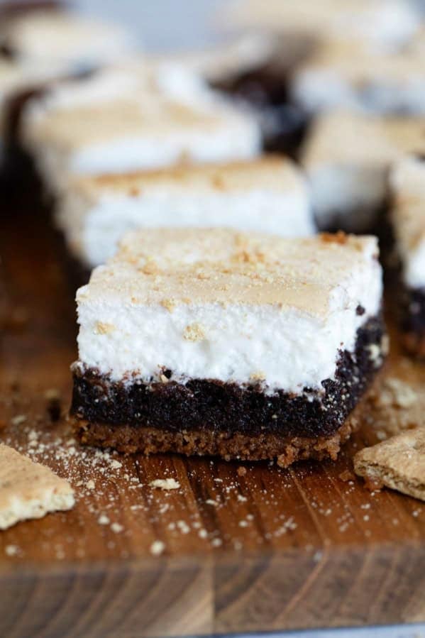 S'mores Brownies with graham cracker crust, gooey brownie center, and marshmallow creme.