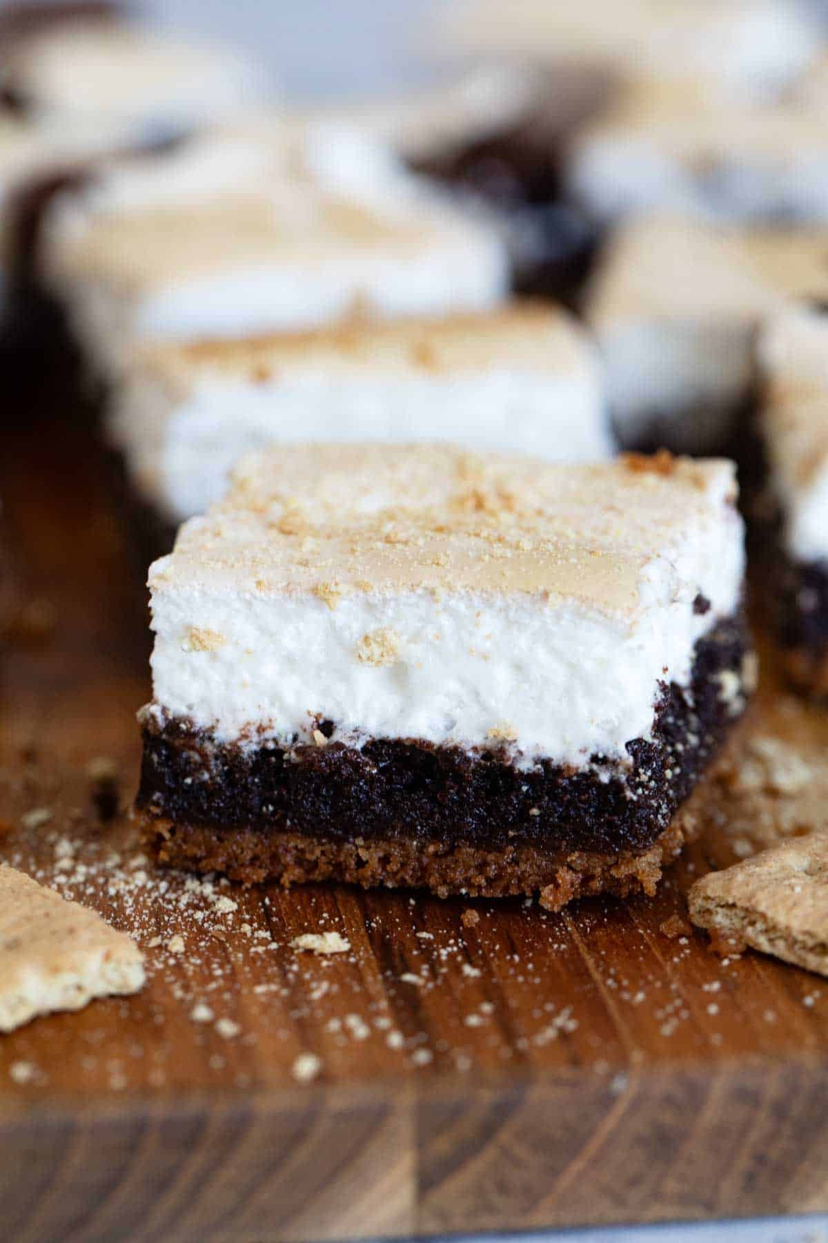 S'mores Brownies with graham cracker crust, gooey brownie center, and marshmallow creme.