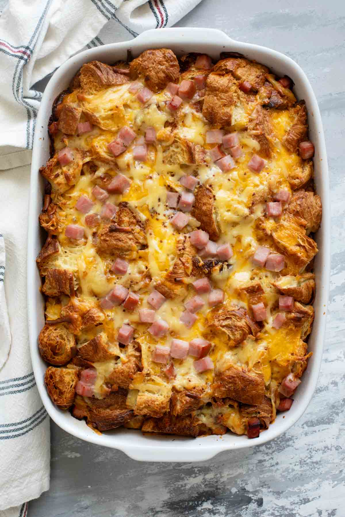 Croissant Breakfast Casserole with ham and cheese.