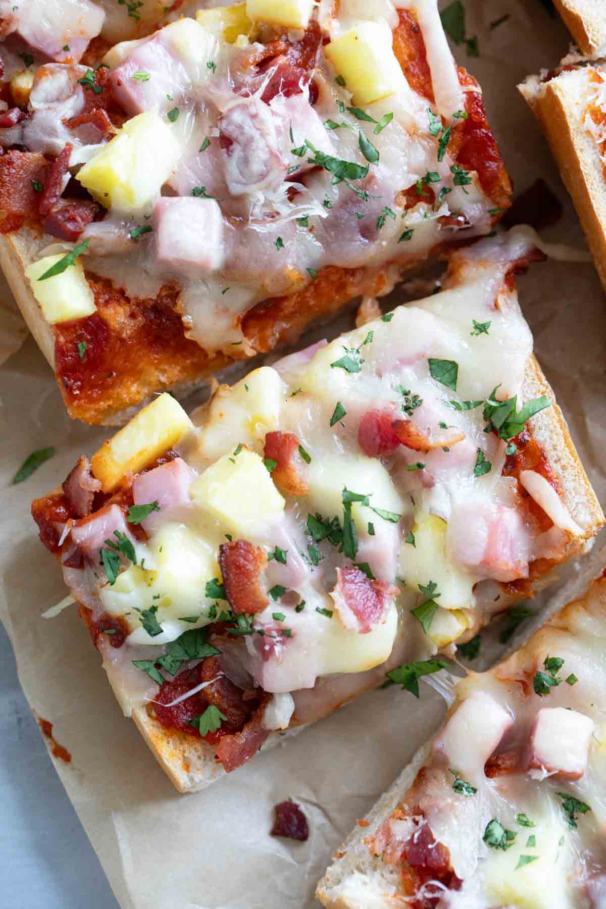 French Bread Hawaiian Pizza with ham, bacon, and pineapple.