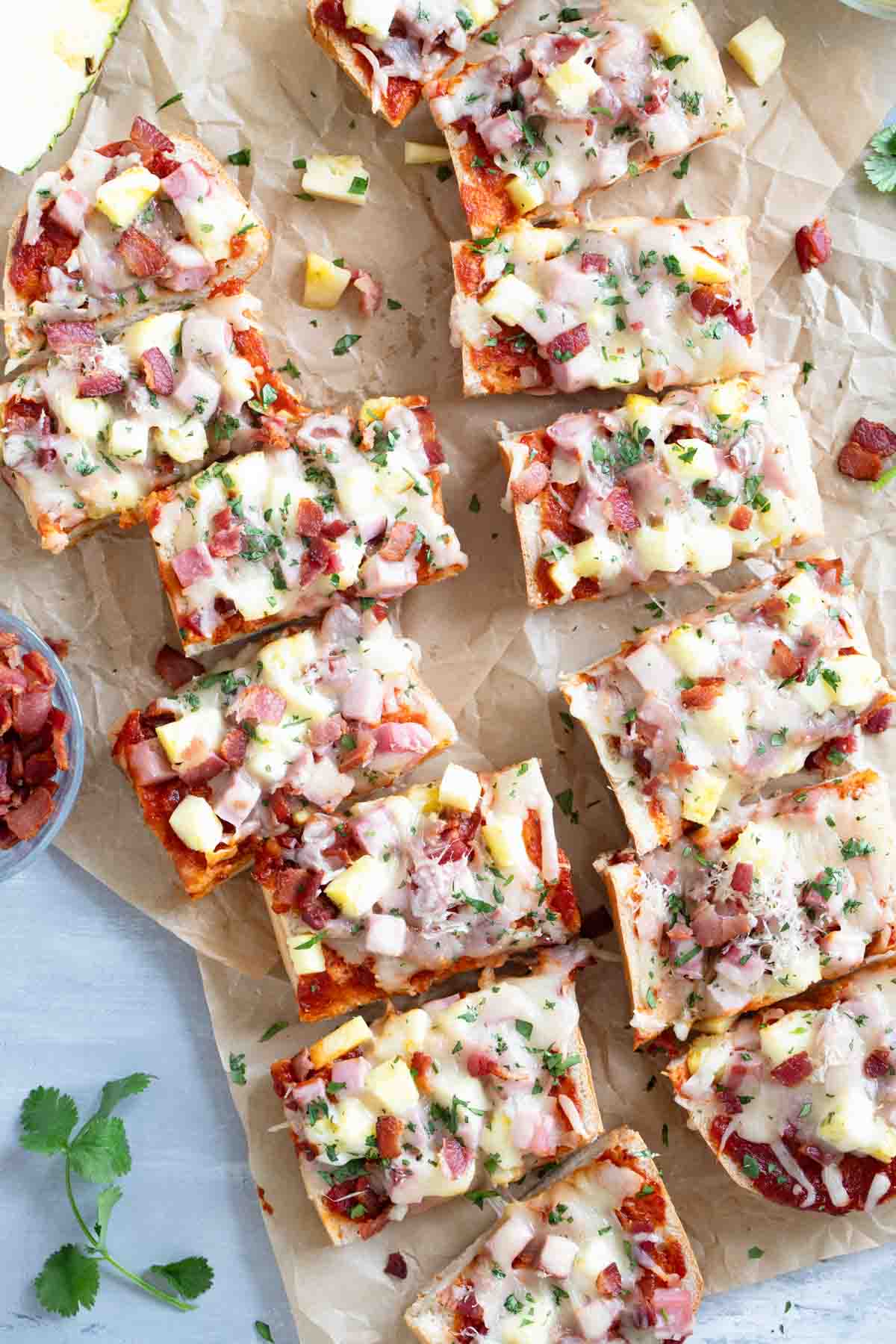 French Bread Hawaiian Pizza cut into slices.