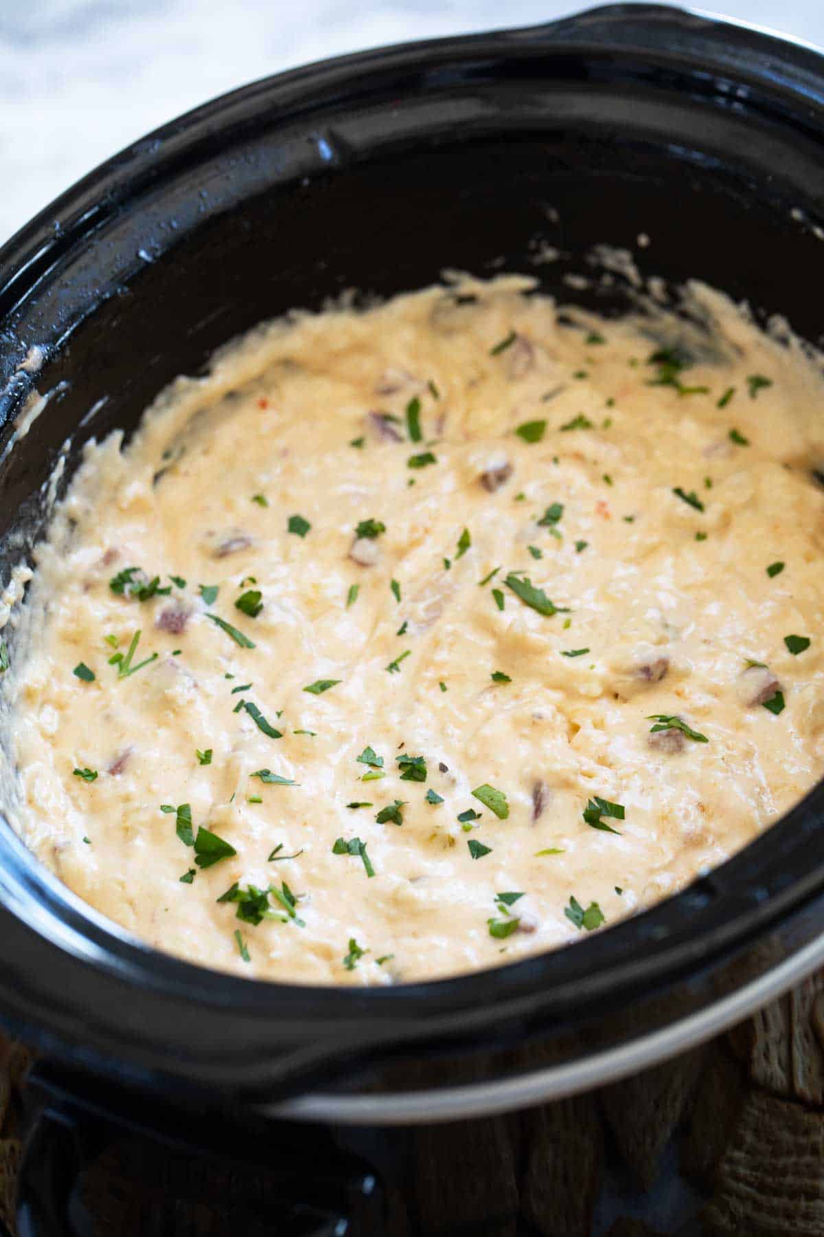 Slow Cooker Reuben Dip in a slow cooker.