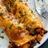 Sweet Potato and Black Bean Enchiladas with cilantro and cheese.