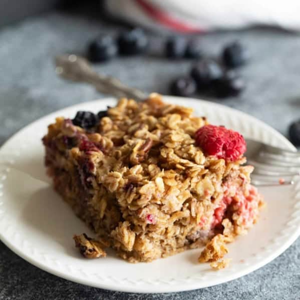 Slice of Baked Oatmeal on a plate with a fork.