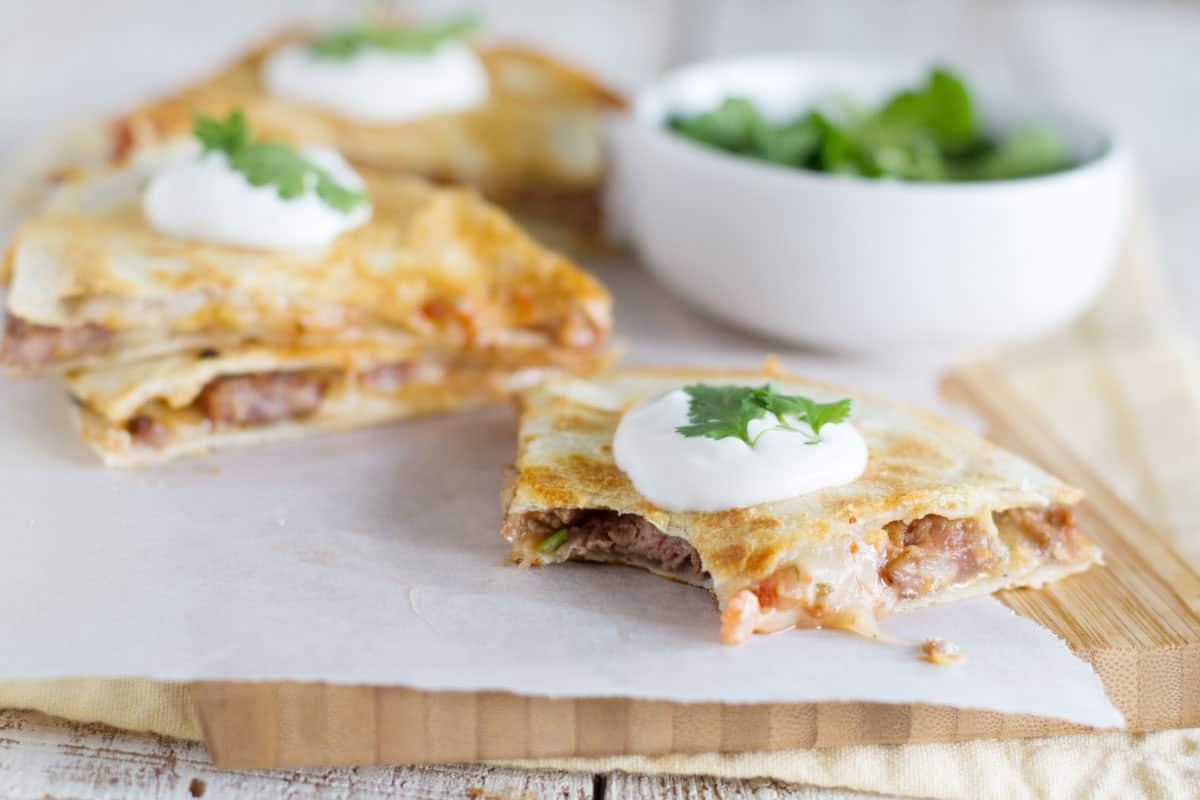 Chipotle Beef Quesadilla with a bite taken from it.