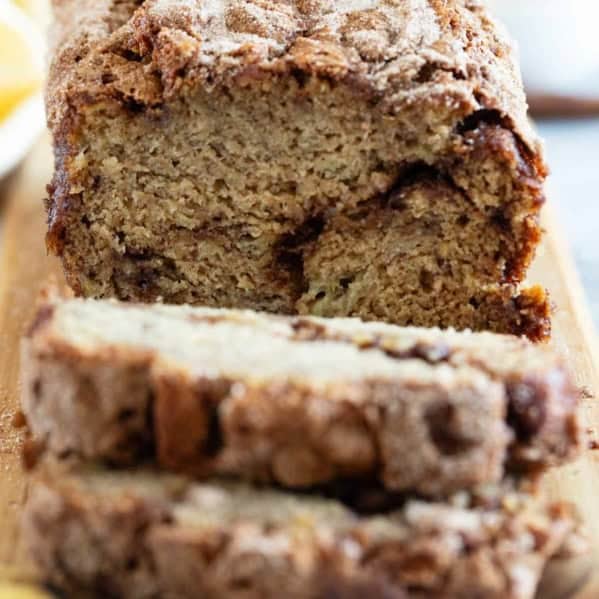 Loaf of cinnamon banana bread cut into slices.