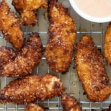 Coconut Chicken Tenders on a cooling rack.