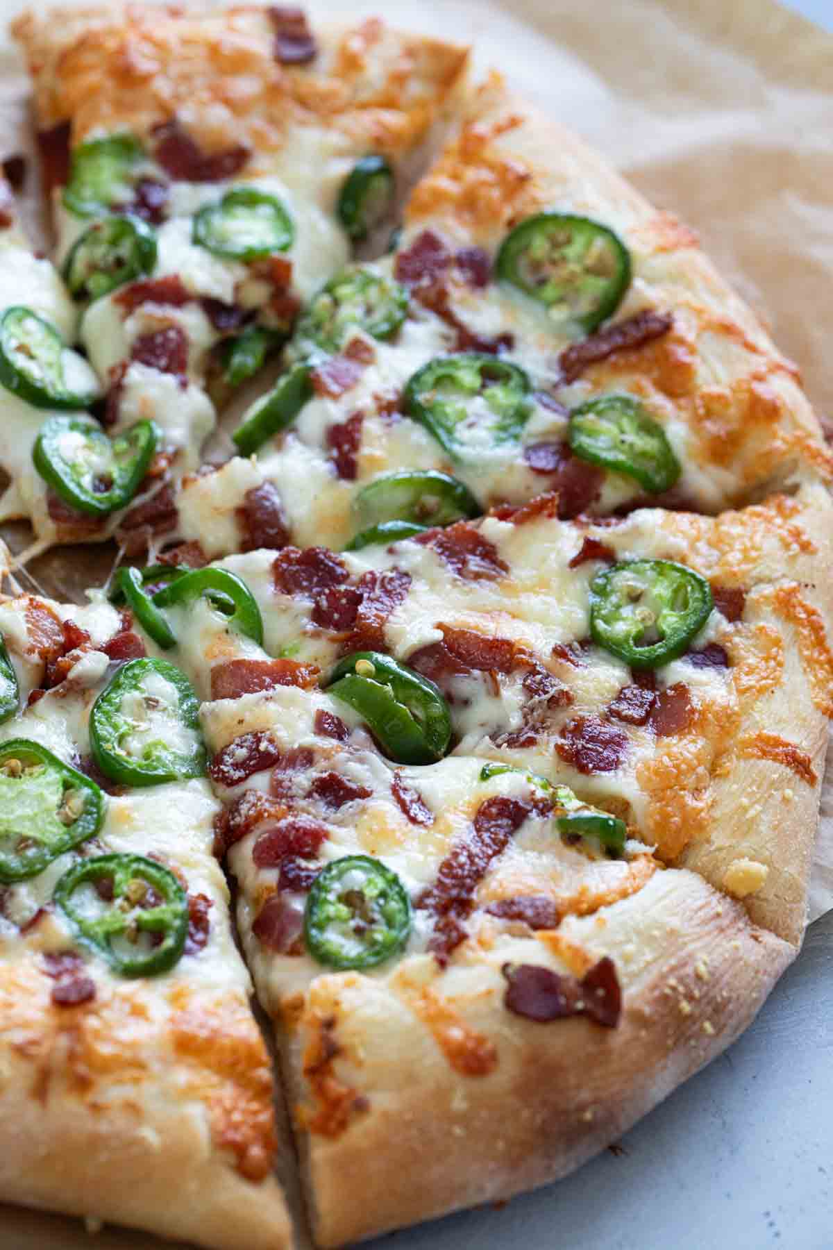 Jalapeño Popper Pizza cut into slices.