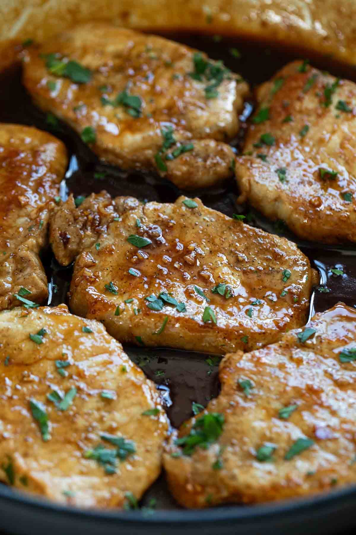 Glazed Pork Chops in a skillet.