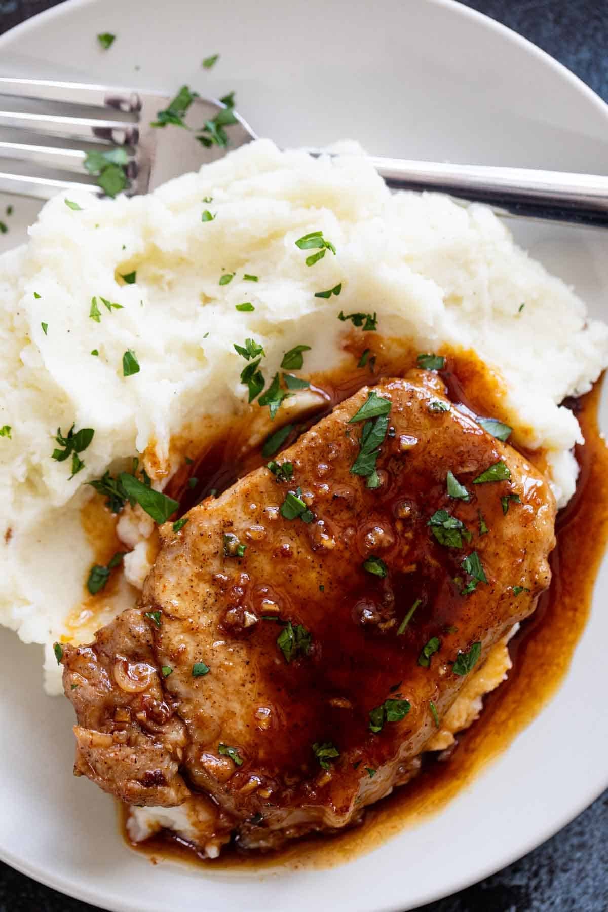 Glazed Pork Chop over mashed potatoes.