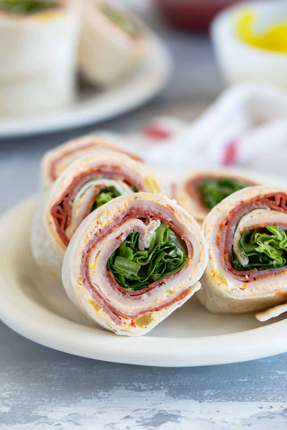 Sliced Italian Pinwheels on a small plate.