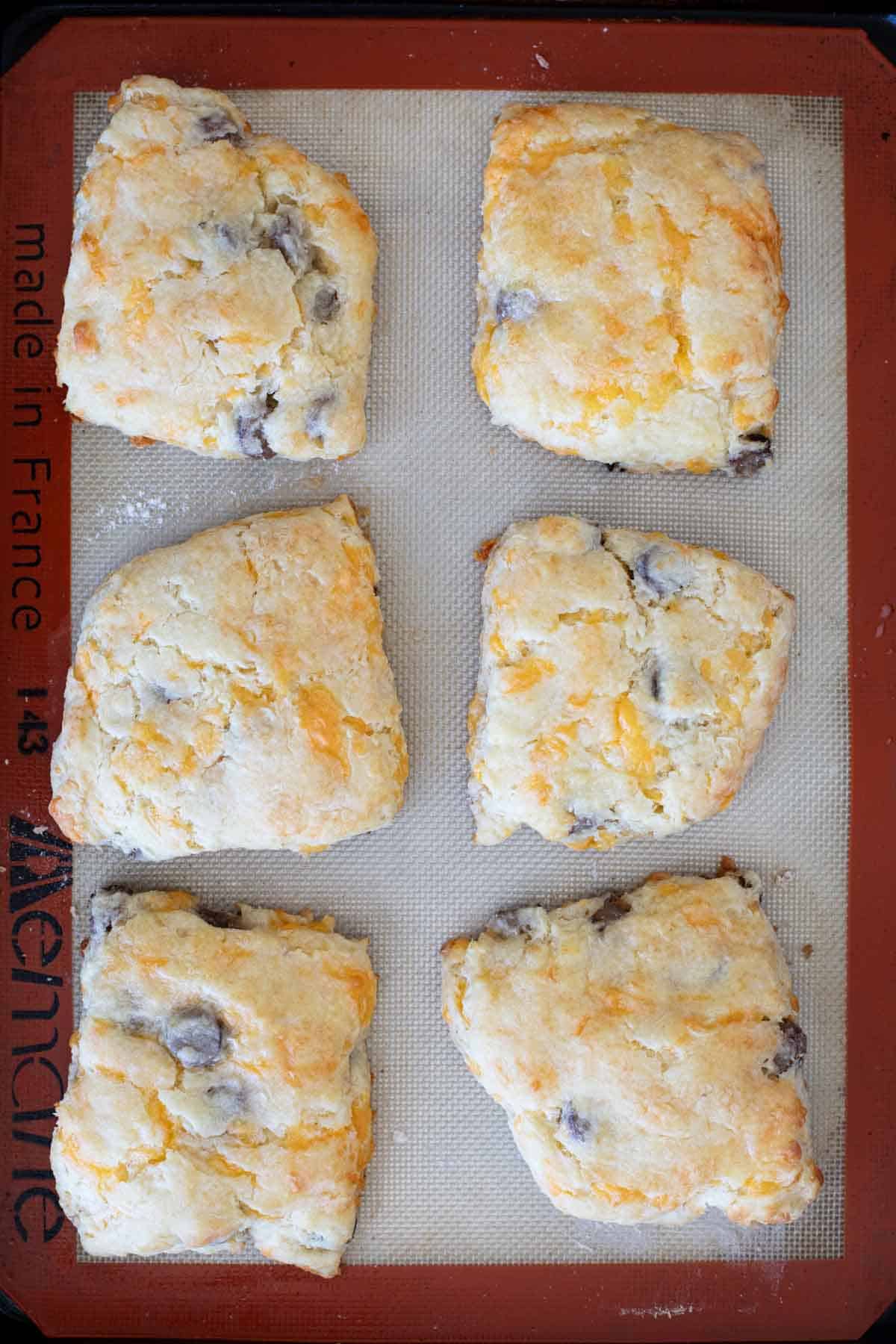 Sausage and Cheese Biscuits on a baking sheet.