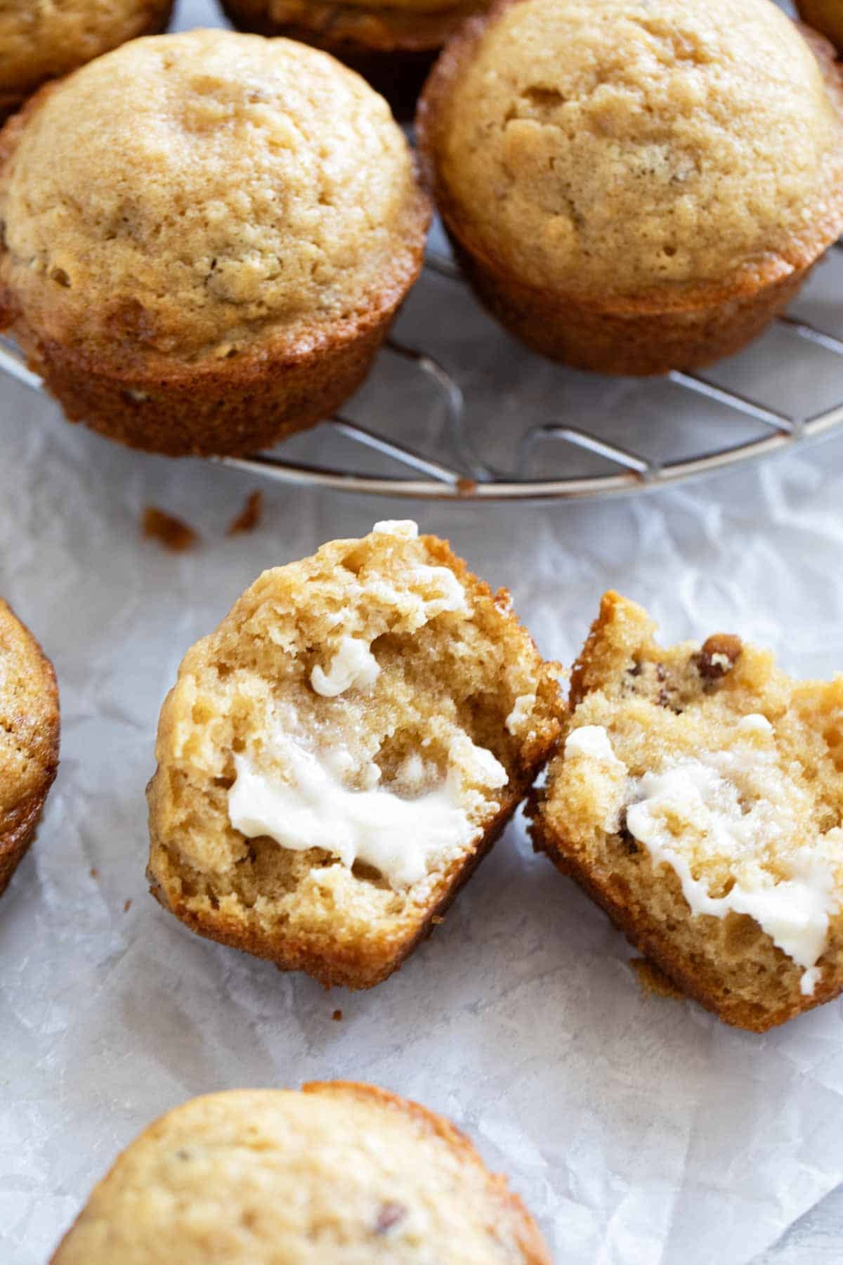 Brown Sugar Muffin torn in half and slathered with butter.