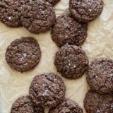 Double Chocolate Oatmeal Cookies on a piece of parchment paper.