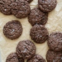 Double Chocolate Oatmeal Cookies on a piece of parchment paper.