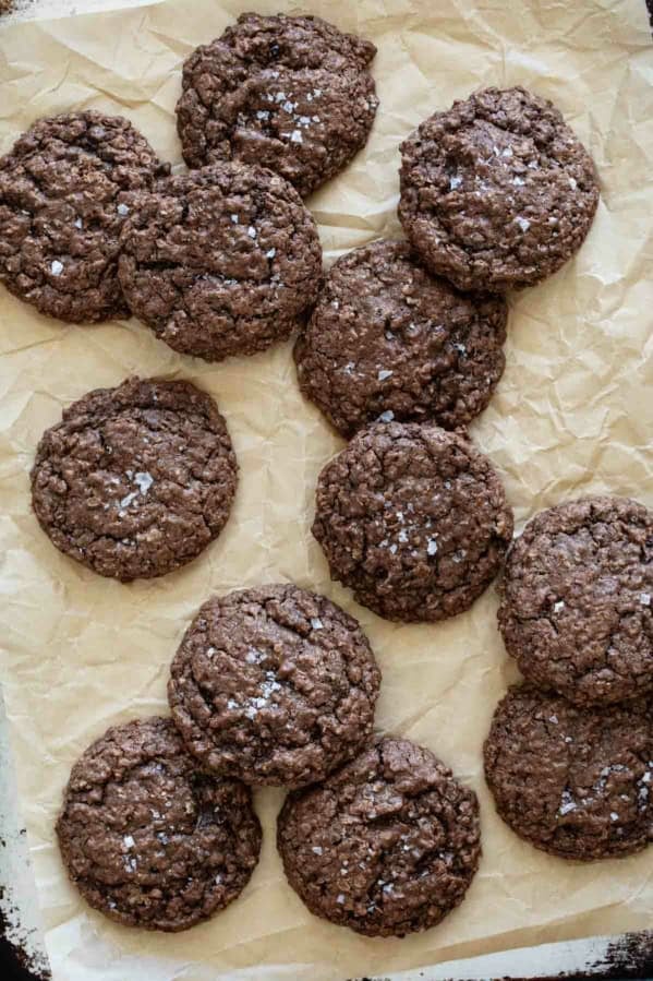 Double Chocolate Oatmeal Cookies on a piece of parchment paper.