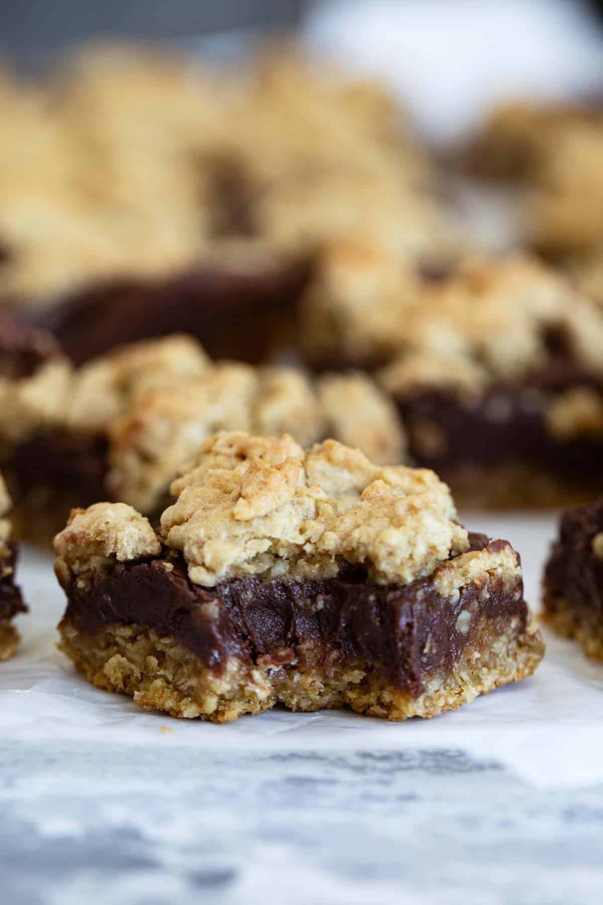 Oatmeal Fudge Bar with a bite taken from it.