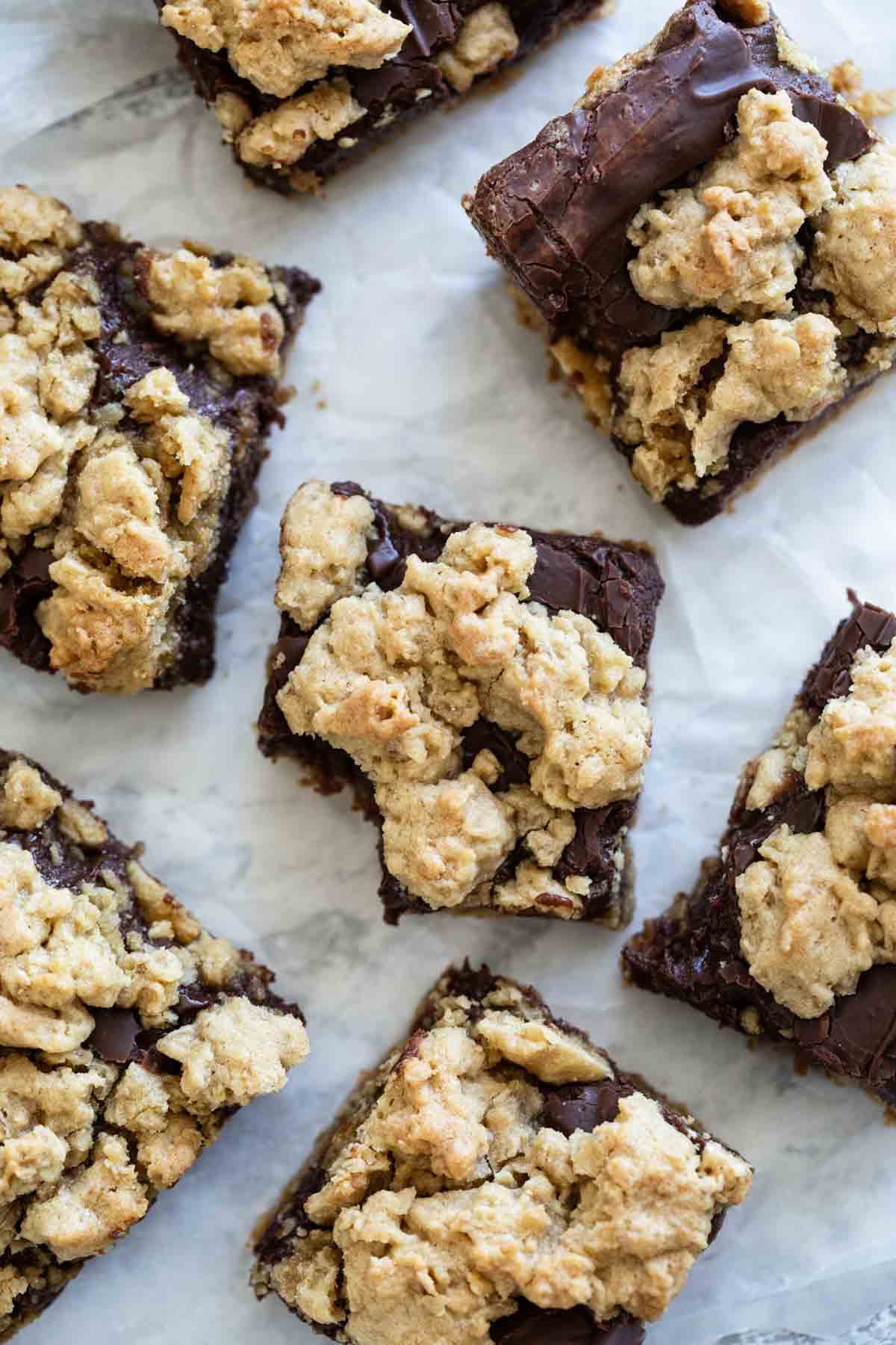 Oatmeal Fudge Bars with a bite taken from one bar.