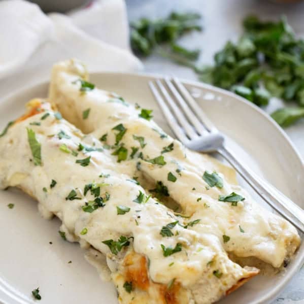 White Chicken Enchiladas on a plate.