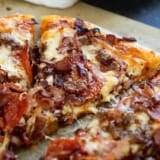 Meat Lover's Pizza with sausage, bacon, pepperoni, and ham.