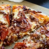 Meat Lover's Pizza with sausage, bacon, pepperoni, and ham.