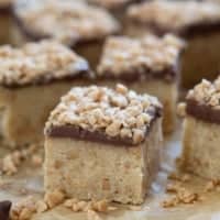 Ritz Cracker Toffee Bars topped with chocolate and toffee.