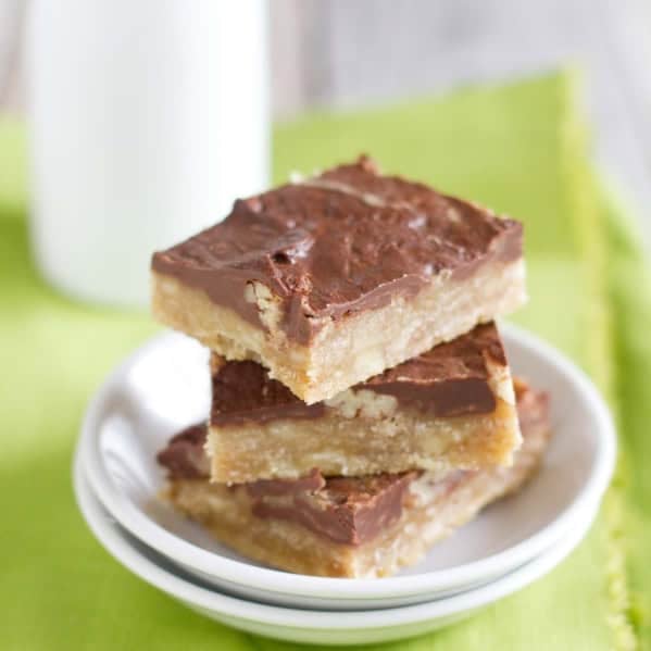 Chocolate Pecan Toffee Bars stacked on top of each other.