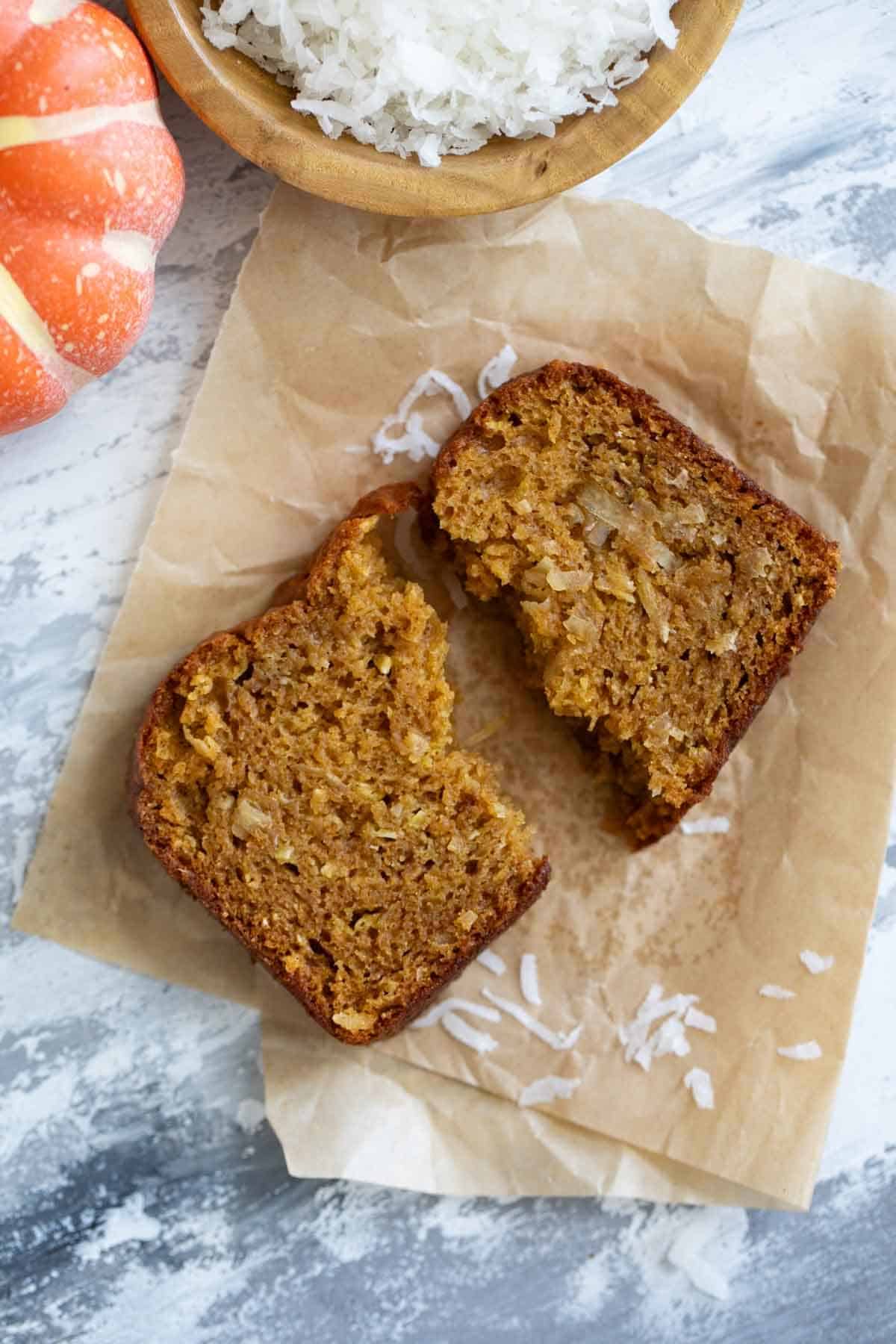 Slice of Pumpkin Coconut Bread torn in half.