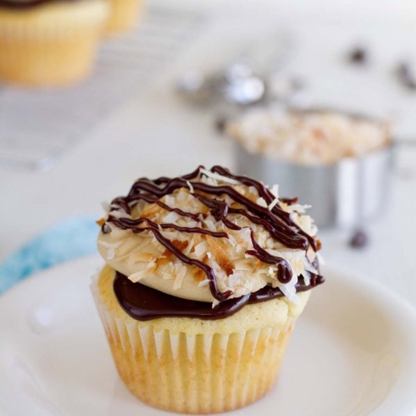 Samoa Cupcakes - caramel filled cupcake with chocolate ganache, caramel buttercream, and toasted coconut.