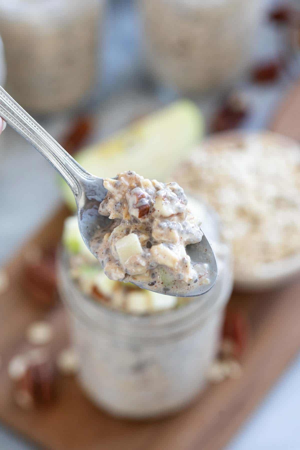 Bite of Apple Pie Overnight Oats on a spoon.